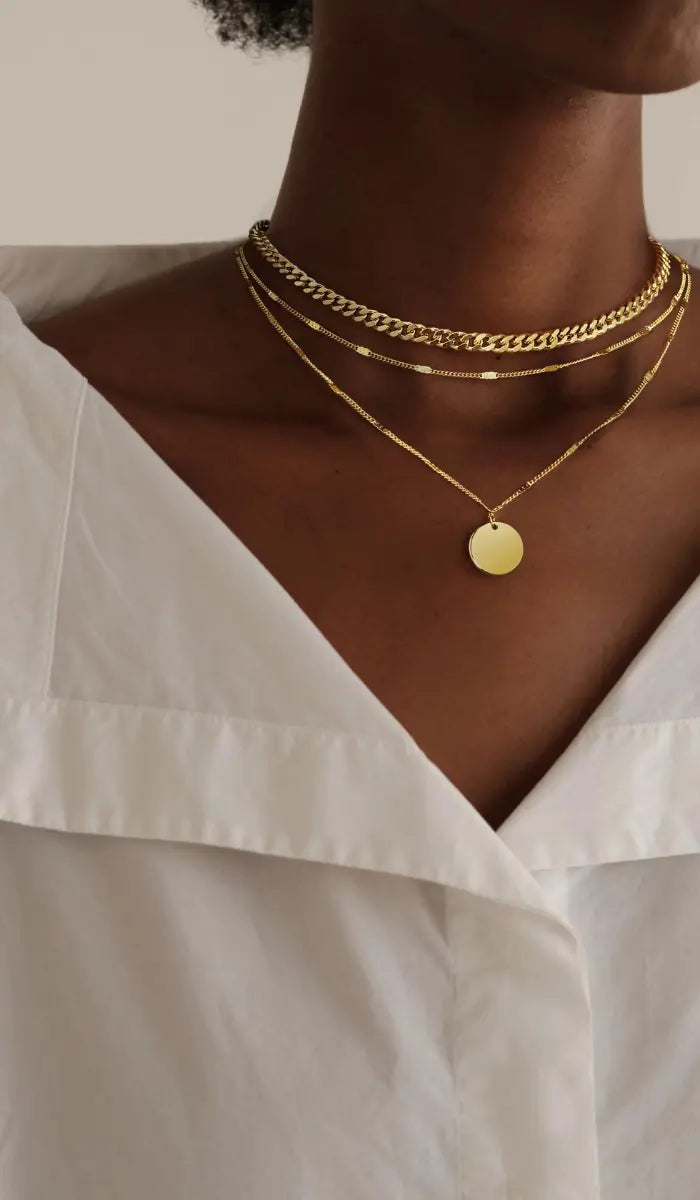 Black Women Wearing Kyerlyn Layered Pendant Gold Necklace