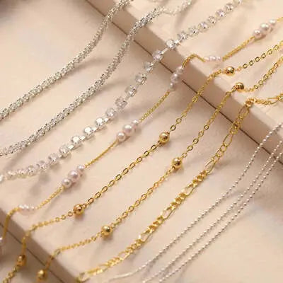 Collection of delicate gold and silver bracelets, showcasing women's bracelet jewelry.