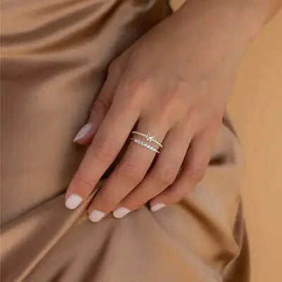 Elegant gold rings with star design, showcasing women's ring jewelry.