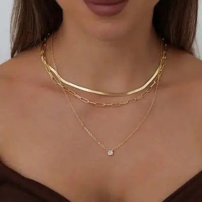 Elegant layered gold necklaces, showcasing women's necklace jewelry.