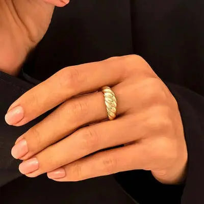 Elegant braided gold ring, showcasing women's ring jewelry.