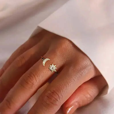 Elegant gold ring with crescent moon and star, showcasing women's ring jewelry.